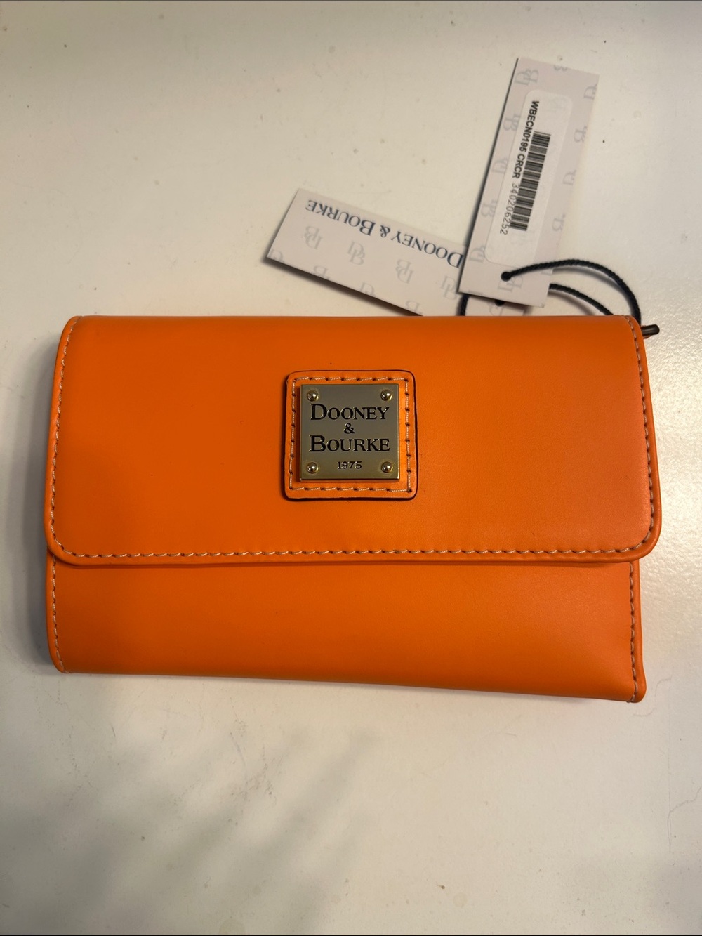 Dooney & Bourke Orange Leather Wallet
